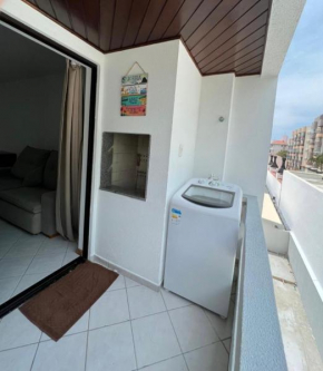 Apartamento com churrasqueira a 100 metros da praia